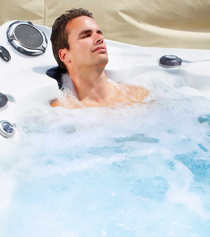 Man relaxed in hot tub